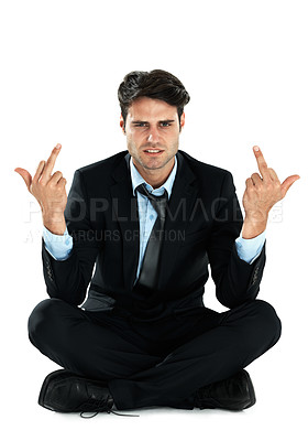 Buy stock photo Portrait, rude and fuck with a business man in studio isolated on a white background showing his middle finger. Hands, sign and gesture with an angry or frustrated male employee on blank space