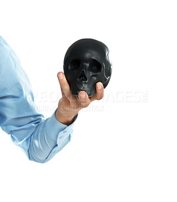 Buy stock photo Death, danger and emoji with a skull in the hand of a man in studio isolated on a white background. Theater, mockup and anatomy with an actor on blank space for art, performance or philosophy