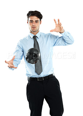 Buy stock photo Business man, black skull and levitation in studio isolated on a white background. Magician, spirit and male employee levitating head or scalp in air for evil, death or occult, voodoo or magic trick.