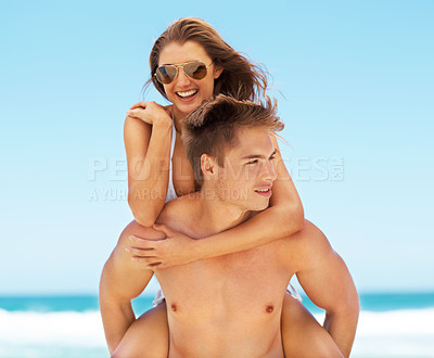 Buy stock photo Piggyback, portrait and a couple at the beach in summer for bonding, holiday or an ocean date. Smile, love and a man and woman being playful at the sea for a vacation, happiness or travel in Bali