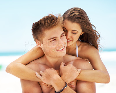 Buy stock photo Smile, couple and piggyback for travel on beach with blue sky, summer holiday and bonding together. Happy, people and embracing with romance for support, tropical vacation and destination outdoor