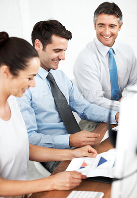 Buy stock photo Businesspeople working together at a desk