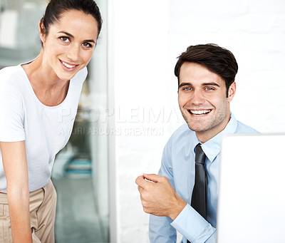 Buy stock photo Young business coworkers working together with a smile