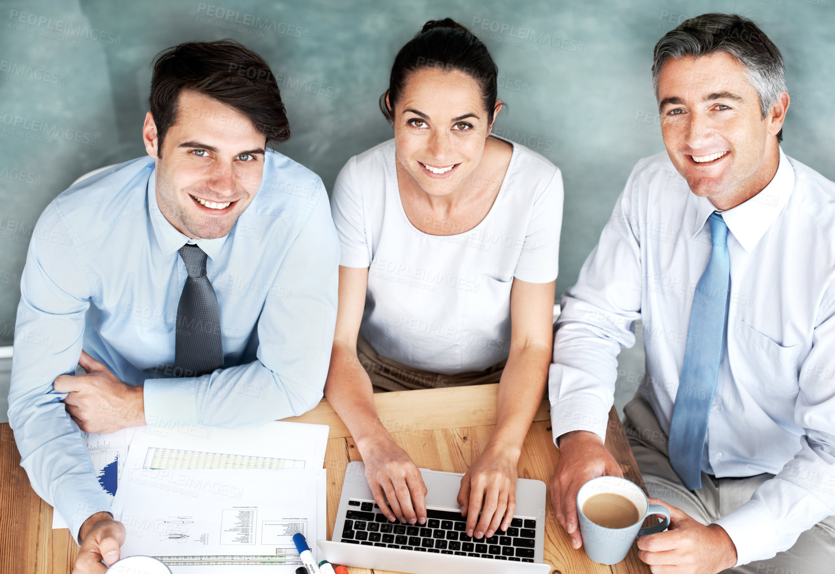 Buy stock photo Happy group, portrait and business people in office for meeting, planning or drink coffee above. Face, team and sales manager on laptop for profit, budget and typing report for performance increase