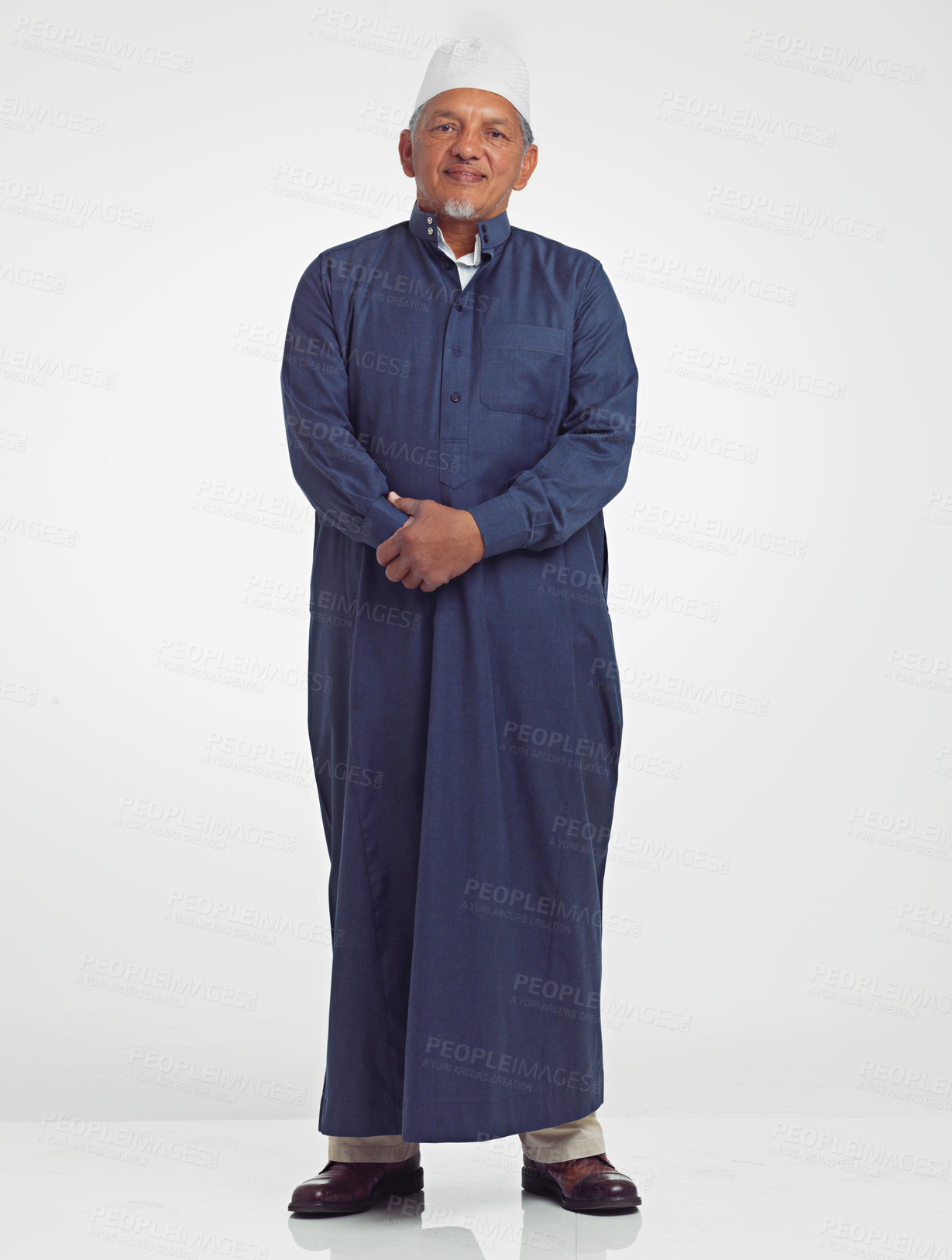 Buy stock photo Muslim old man, studio portrait and islamic culture standing isolated on white background with arabic clothes. Senior moslem person, eid mubarak and spiritual worship for ramadan, fasting or allah.