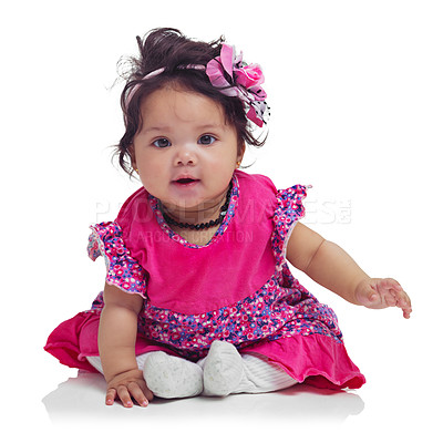 Buy stock photo Cute, happy and portrait of a baby girl sitting isolated on a white background in a studio. Girly, playful and innocent, adorable and small child smiling with happiness on a studio background
