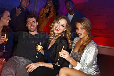 Buy stock photo Group, friends and portrait with champagne to celebrate in nightclub for birthday party, new years or social event together. Nightlife, club and happiness friendship celebration with alcohol drink