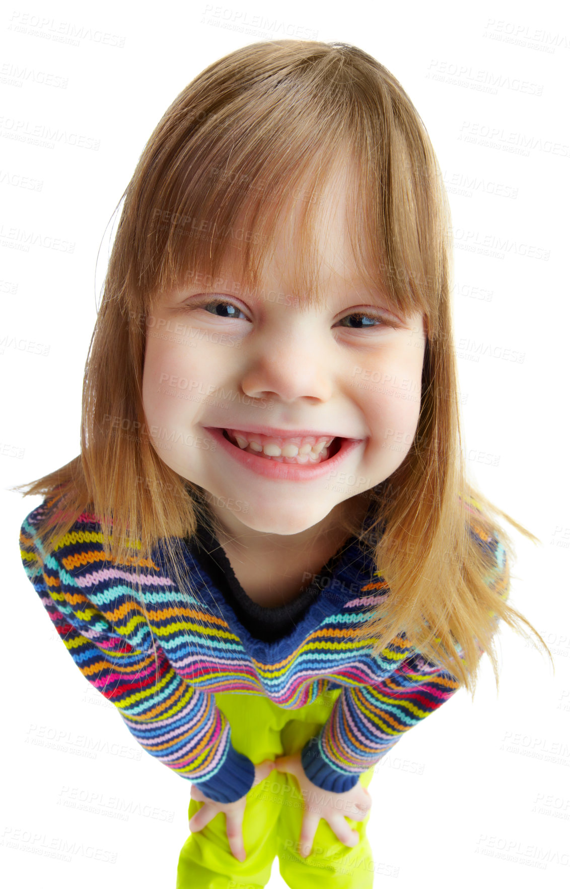 Buy stock photo Portrait of a cute little girl smiling while isolated against a white background