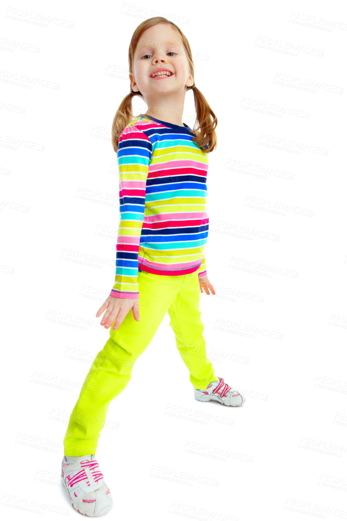 Buy stock photo Full length portrait of a playful little girl smiling while isolated against a white background