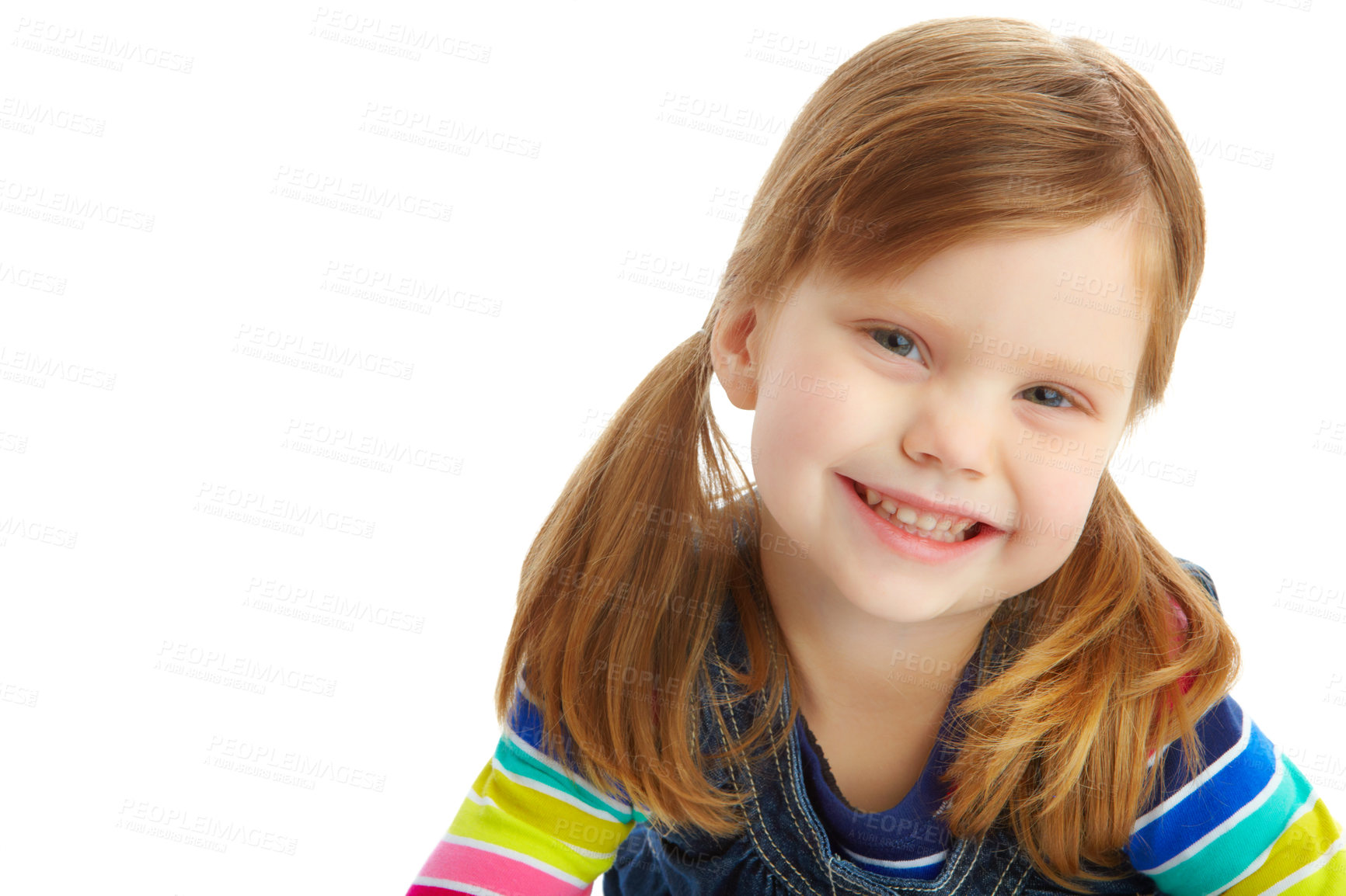 Buy stock photo Portrait of a little girl with pigtails smiling while isolated against a white background