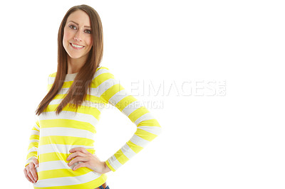 Buy stock photo Portrait of a pretty young woman smiling with her hands on her hips while isolated on white