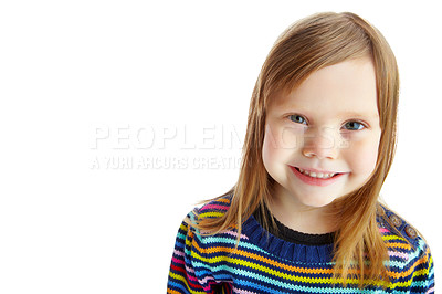 Buy stock photo Portrait of a cute little girl smiling while isolated against a white background