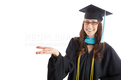 Buy stock photo Woman, graduation and success with open hand in studio portrait with mock up space by white background. Person, university student and choice for learning, education and celebration for achievement