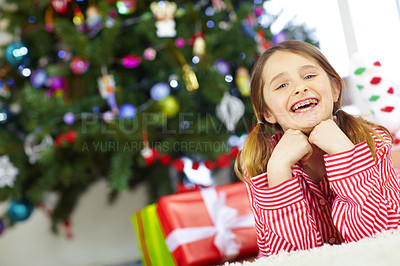 Buy stock photo Young girl, holiday celebration and Christmas morning at family home, ready for gift and happy with braces in portrait. Excited to celebrate, kid and happiness for present, Christmas tree decoration 