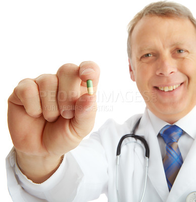 Buy stock photo Portrait, doctor and man with pills in studio isolated on a white background. Face, healthcare and happy medical worker, pharmacist and mature male holding drug medicine, medication or capsule remedy