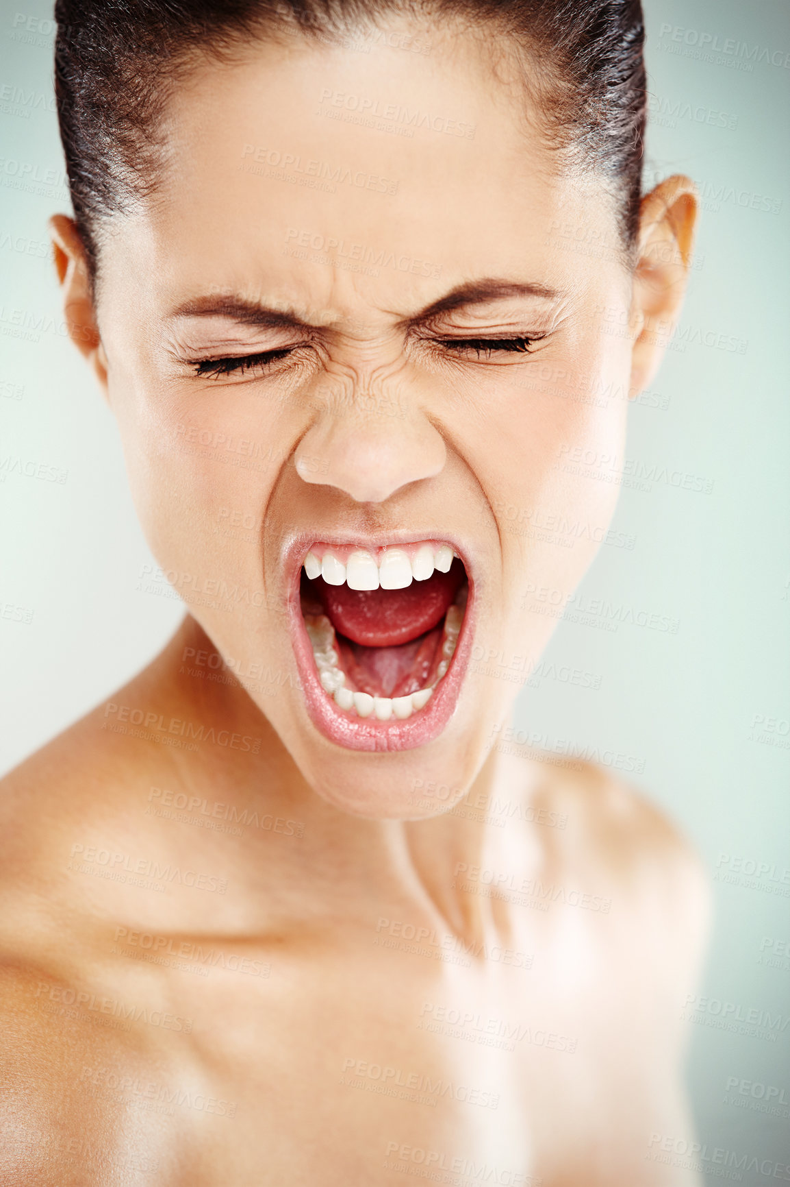 Buy stock photo Woman, face and shout on studio background with anger, frustrated and rage. Female person, screaming and bad news with emotions for expression, mental health and cathartic exercise for psychology