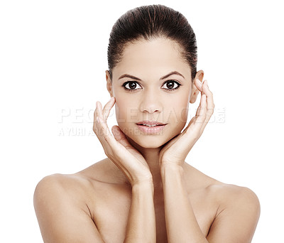 Buy stock photo A gorgeous young woman framing her face with her hands while isolated on white