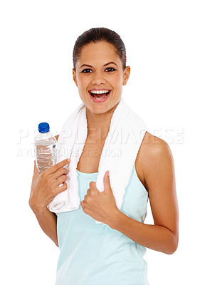 Buy stock photo A excited young woman holding a water bottle after an invigorating workout