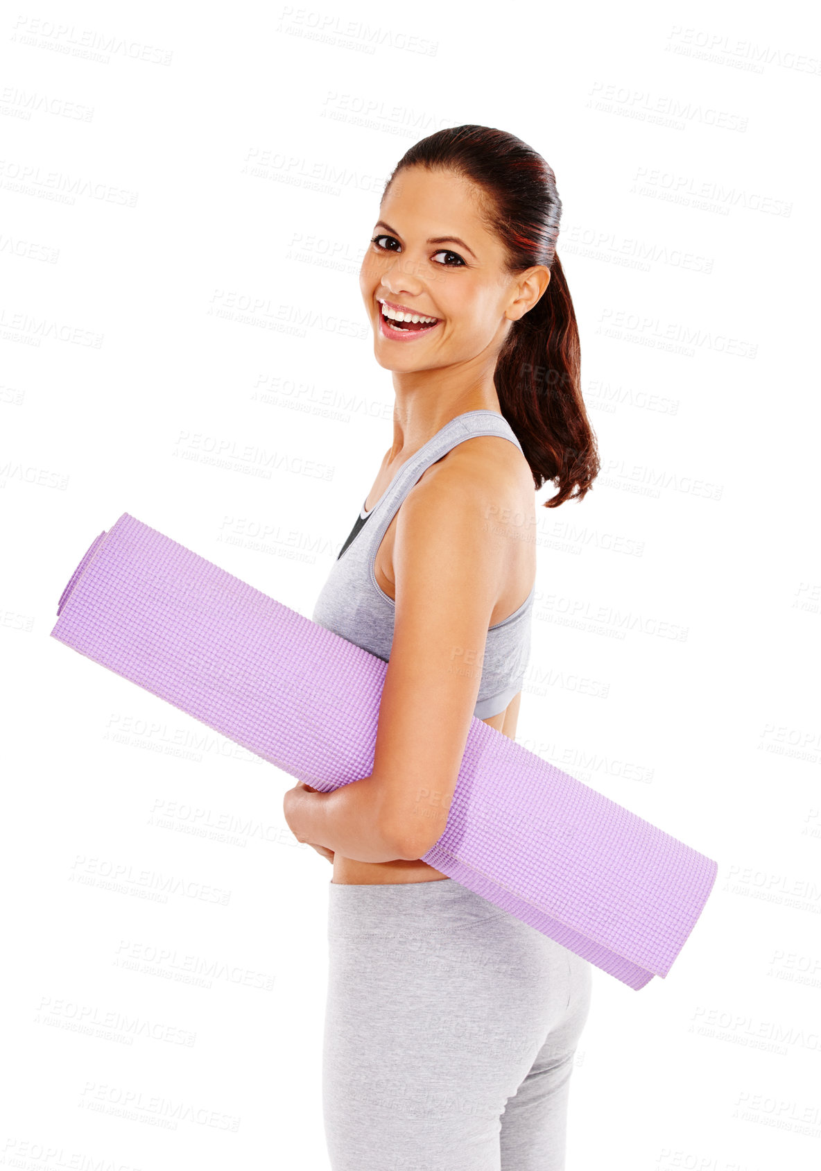 Buy stock photo Portrait of a pretty young woman holding an exercise mat while isolated on white