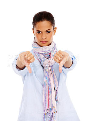 Buy stock photo Portrait, thumbs down and emoji with a black woman in studio isolated on a white background to disagree. No, rejection and deny with a young female showing a negative hand sign on blank space