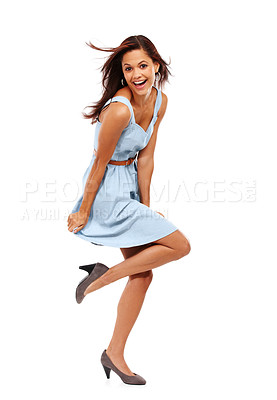 Buy stock photo Woman, dress and wind studio portrait with laugh, happy and trendy style with shoes by white background. Person, model and smile with blue clothes, excited and stiletto heels for fashion in Spain