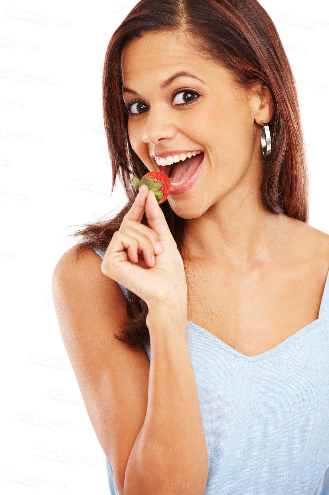 Buy stock photo Studio, portrait and woman with strawberry for eating, nutrition and health benefits with vitamin c. Female person, organic fruit and biting by white background for wellness, snack and smile for diet