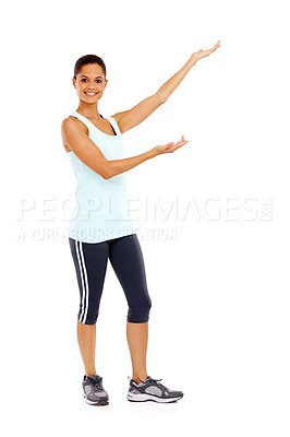 Buy stock photo Full-length portrait of a beautiful young woman holding up copyspace