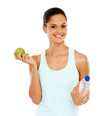 Buy stock photo Portrait of an attractive young woman holding an apple and a bottle of water