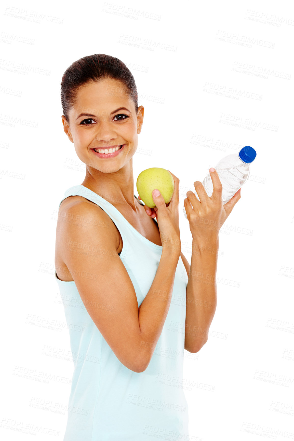 Buy stock photo Portrait of an attractive young woman holding a bottle of water and an apple