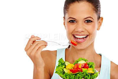 Buy stock photo Portrait of a beautiful young woman eating a healthy salad