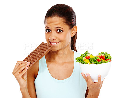 Buy stock photo Portrait of a beautiful young woman choosing between a healthy salad an a chocolate slab