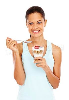 Buy stock photo Portrait of an attractive young woman enjoying a delicious breakfast
