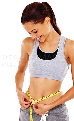 Buy stock photo Measuring tape, fitness and woman in studio for weightloss, exercise and body waist goals. Wellness, health and female person with measurement tool for tummy slimming progress by white background.