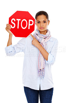 Buy stock photo Woman, pointing at stop sign and portrait with traffic rules for caution, stop and road sign isolated on white background. Warning sign, red with limit and danger, road regulations and signage