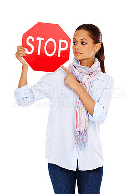 Buy stock photo Woman, pointing and stop road sign, traffic rules and caution with stop sign isolated on white background. Warning sign, red with limit and danger, road regulations and  young female with signage