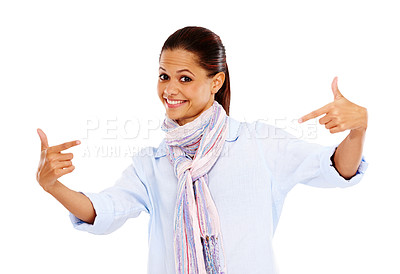 Buy stock photo Playful, fashion and portrait of a woman pointing with a smile isolated on a white background. Happy, stylish and fun model advertising clothes for winter with a gesture on a studio background