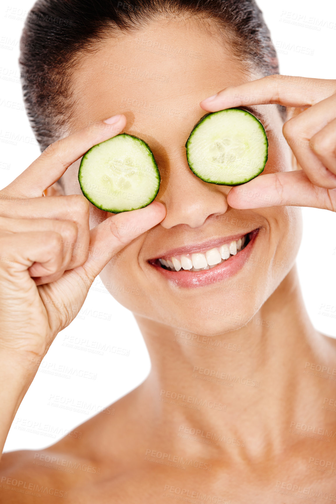 Buy stock photo Happy woman, cucumber eyes and dermatology in studio, eco friendly skincare and nutrition for hydration. Female person, glow and organic beauty or facial treatment, benefits and white background