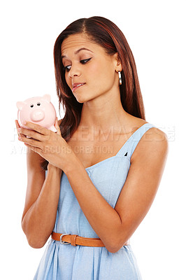 Buy stock photo Woman, piggy bank and thinking in studio with savings, planning and anxiety for economy by white background. Person, model and container for coins, money and ideas for financial investment in Spain