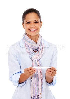 Buy stock photo Face, smile and woman with pregnancy test in studio isolated on a white background. Pregnant, good news and young female or future mother holding maternity exam kit and happy with positive results.