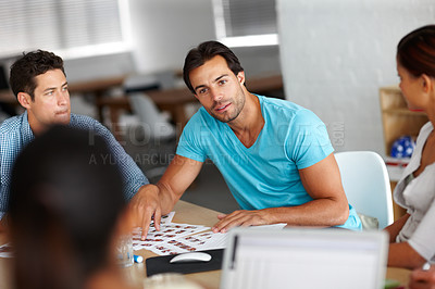 Buy stock photo A group of businesspeople discussing work
