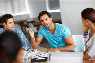 Buy stock photo A group of businesspeople discussing work