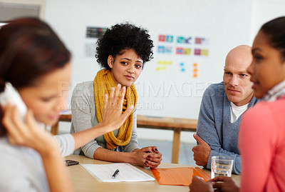 Buy stock photo Office, communication and phone call with stop hand for distraction, silence and focus. Shut up, quiet and rude girl employee on smartphone talking at desk with unhappy coworkers together.