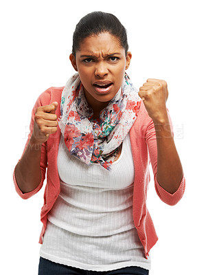 Buy stock photo Portrait of a young woman pulling her fists at you in anger
