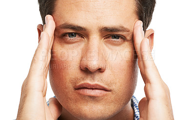 Buy stock photo Portrait of a young man holding his head as a result of a splitting headache