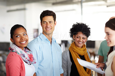 Buy stock photo Shot of a diverse group of colleagues in an office