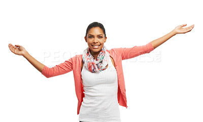 Buy stock photo Pretty young woman presenting copyspace against a white background with a smile