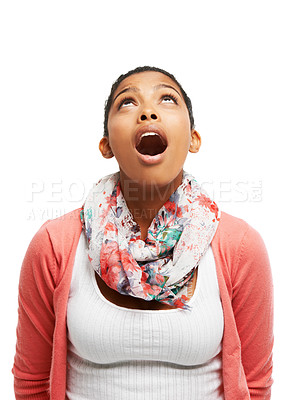 Buy stock photo Cropped view of a young woman looking up and gasping in surprise