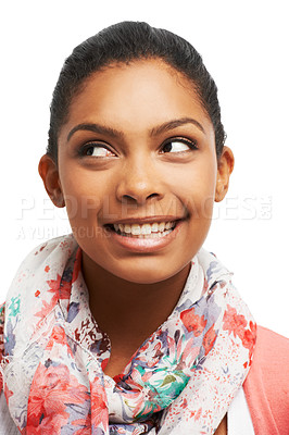 Buy stock photo Pretty young woman smiling while looking away thoughtfully