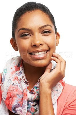 Buy stock photo Pretty young woman smiling while touching her face against a white background