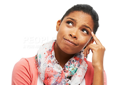 Buy stock photo Cute young woman scratching her head and looking up thoughtfully